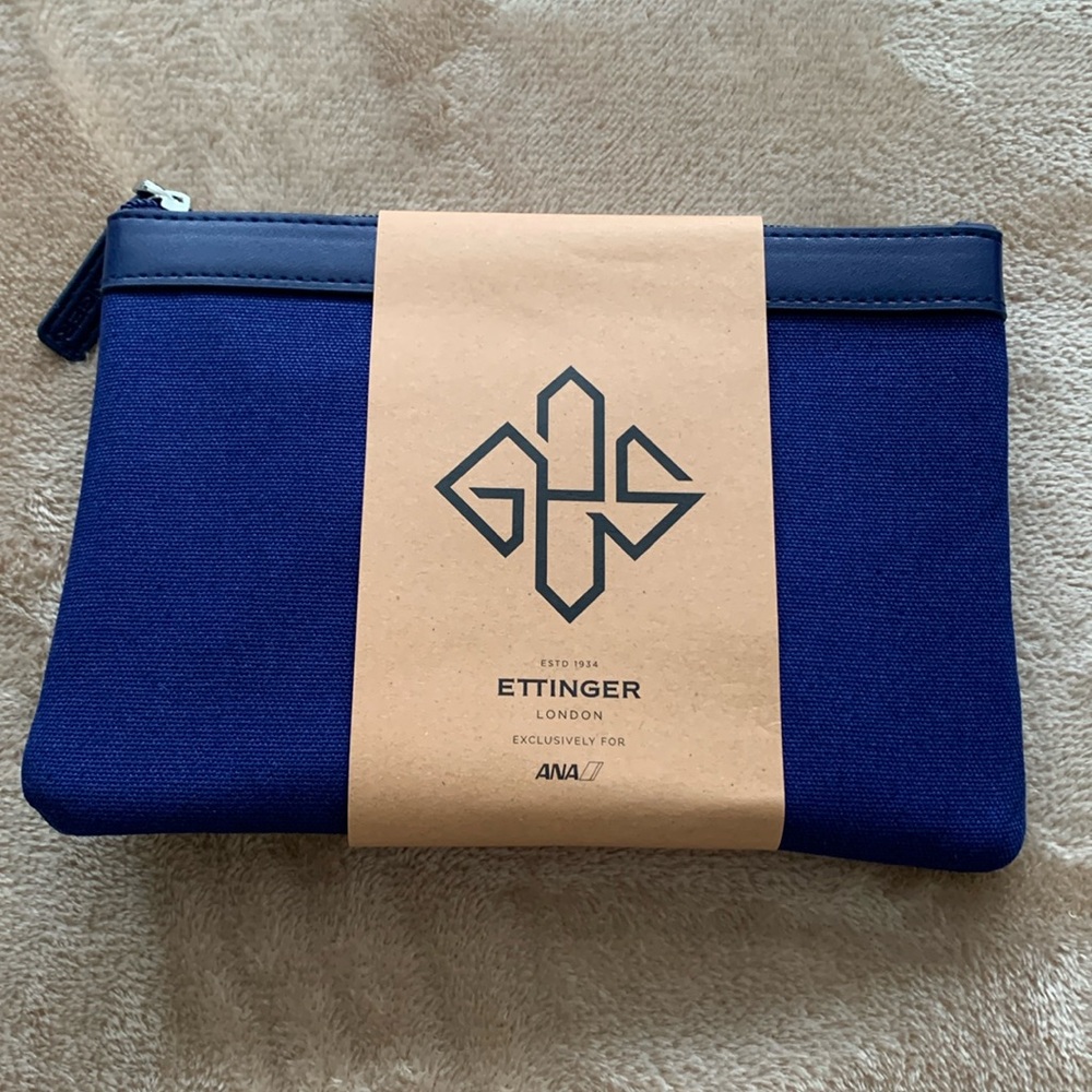ETTINGER London cosmetic bag and AVEDA skin care kit